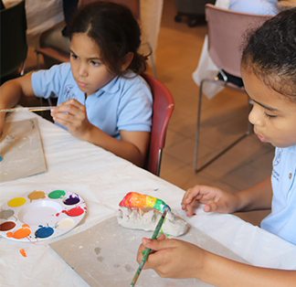 Students enjoying painting together